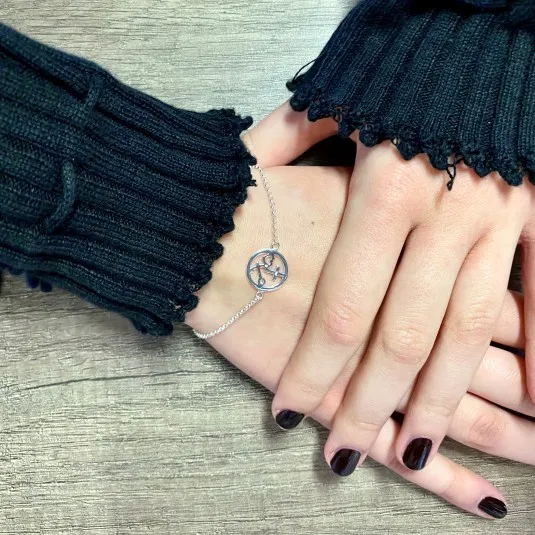 BRACELET AVEC SYMBOLES CROIX, COEUR, ANCRE EN ARGENT